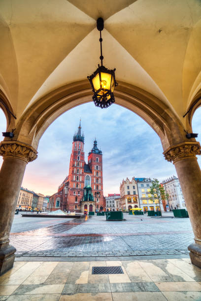 istock St. Mary's Basilica on the Krakow Main Square at Sunrise, Krakow 1173533556