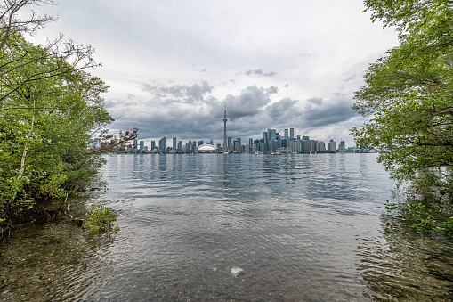 CN Tower, Toronto - 6 Aug 2019 -  Waterfront view of Toronto City Skyscrapers along with CN Tower and Rogers Centre, Toronto, Ontario, Canada