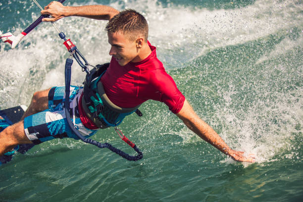istock Professional kiter makes the difficult trick on a beautiful background. 1173541831