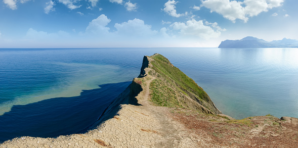 Wide panoramic view of the sea and part of coastline from the clay cape protruding into the sea