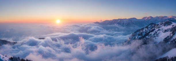 istock Sunset Above The Fog 1173543460