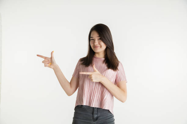 istock Beautiful girl's half-length portrait on white studio background 1173544711