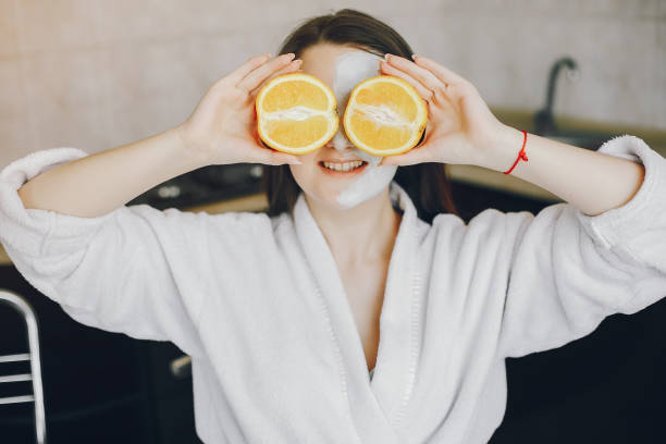 istock girl in a white dressing gown 1173546636