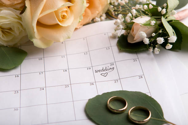 istock Creative flat lay of two golden rings with date choosing 1173547982