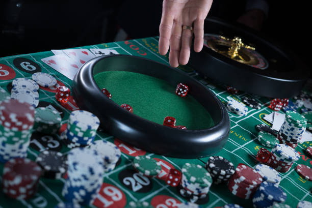 istock Poker Chips with roulette, gambling games concept. 1173550192