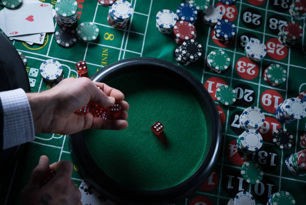 istock Poker Chips with roulette, gambling games concept. 1173550205