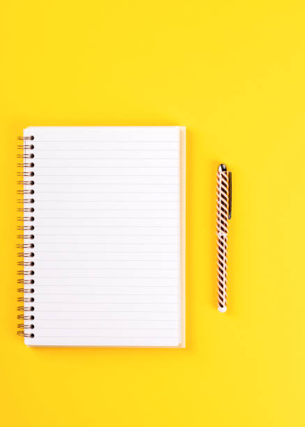 istock Notebook, and pen on a bright yellow background.Accessories office concept.Business Idea. Time to school.Top View.Flat Lay. Copy space for Text. 1173550740