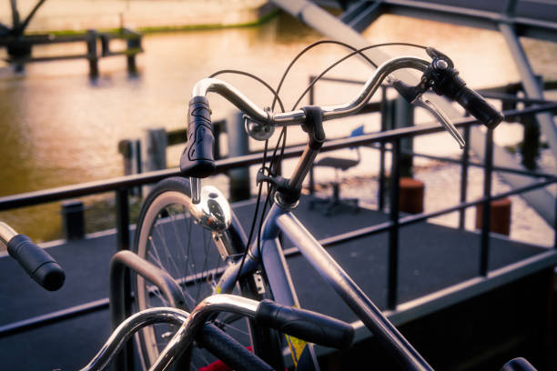 istock Bicycle parking with old and new bicycles, sunny day outside Amsterdam view. 1173551825