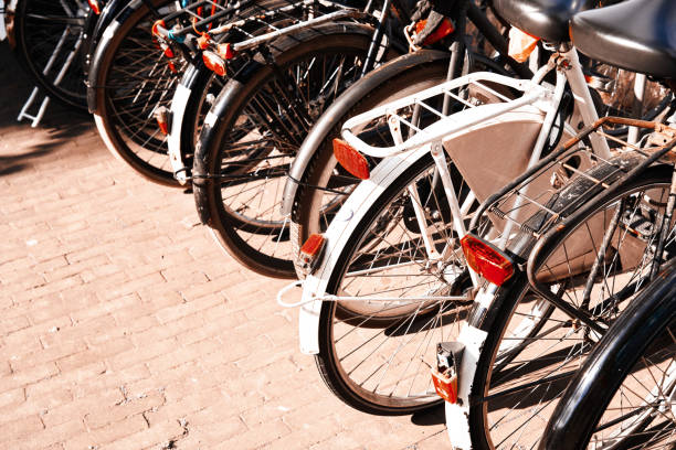 istock Bicycle parking with old and new bicycles, sunny day outside Amsterdam. 1173551875