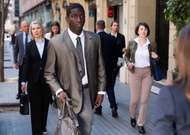 istock African businessman walking on street 1173555650