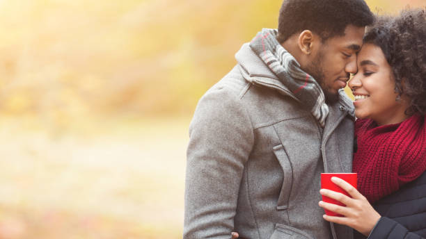 istock Romance and fall mood. Couple in love with coffee cup 1173556251