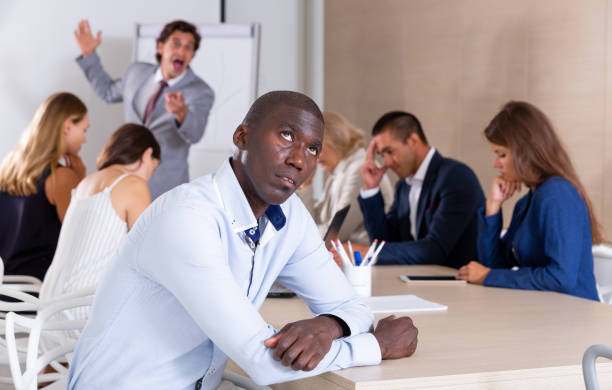 istock Upset Afro male office worker on meeting 1173557414