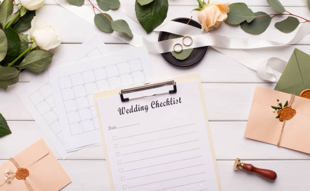istock Wedding checklist for planning and other accessories on wood 1173558122
