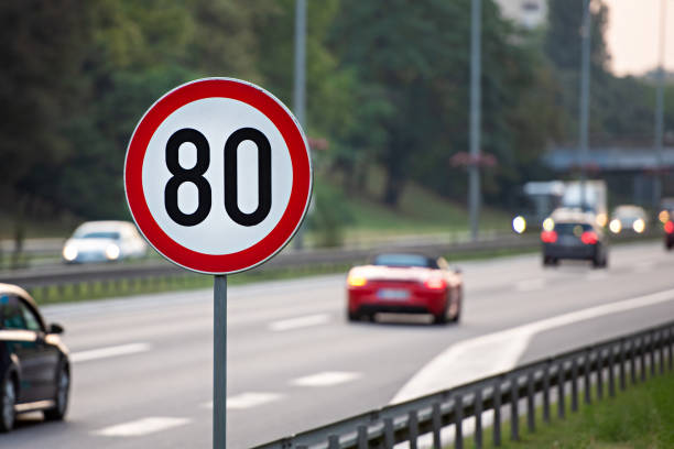 istock 80km/h Speed limit sign a highway 1173559553