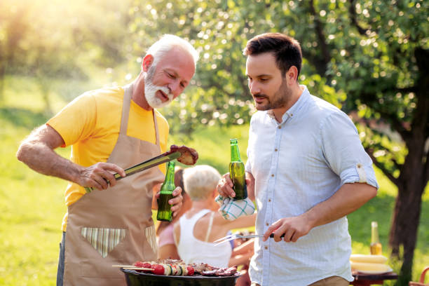 istock Family make barbecue together 1173560480