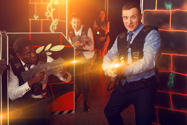 istock men and women co-workers having corporate entertainment 1173560680