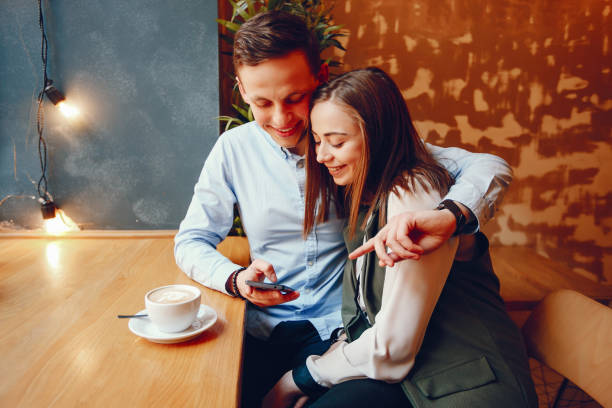 istock cute couple in a cafe 1173561213