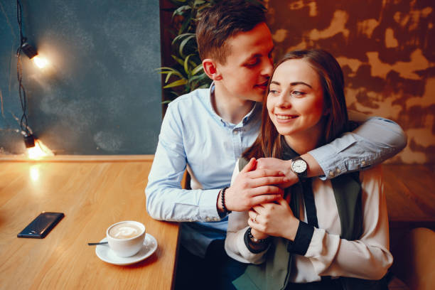 istock cute couple in a cafe 1173561244