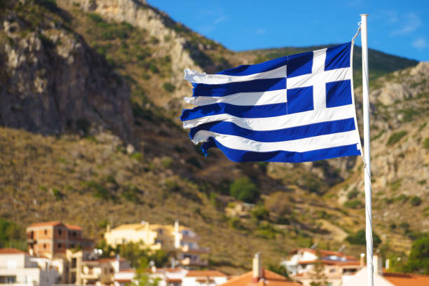 istock Greek flag against town 1173562593