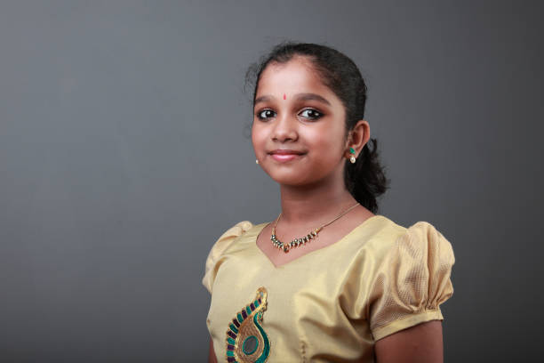 Portrait Of A Smiling Girl Wearing Indian Traditional Dress Stock Photo -  Download Image Now - iStock