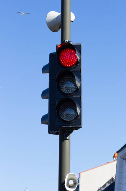 istock River traffic light for ferry boats with the red light 1173564689