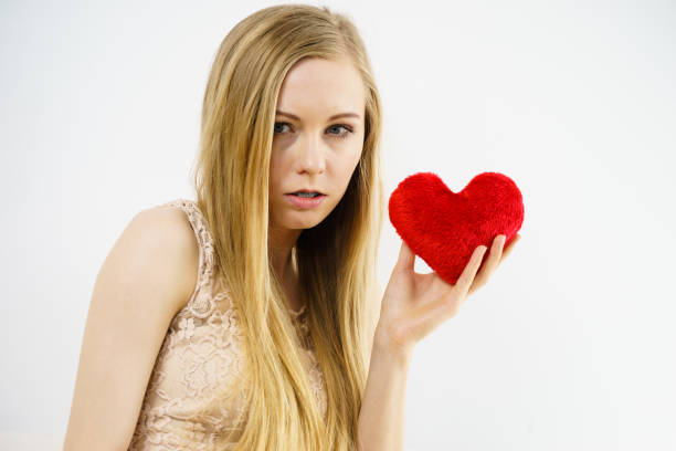 istock Sad woman on Valentines day 1173564759
