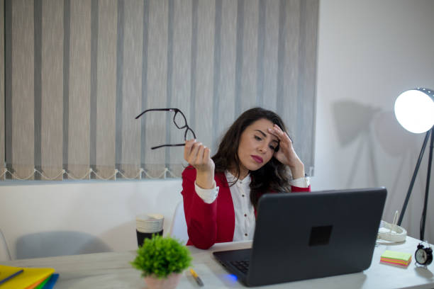istock Beautiful girl in the office 1173565088