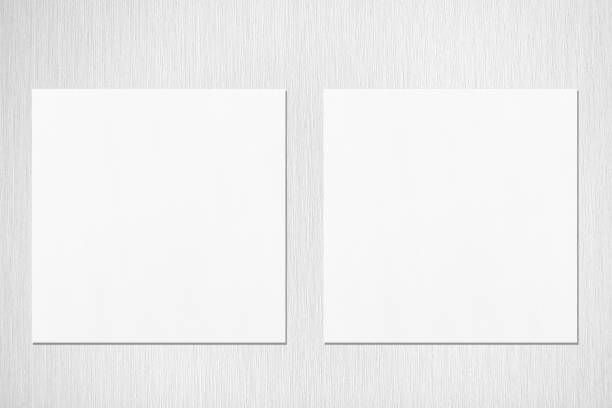 istock Two empty white square flyer or business card mockups 1173565145
