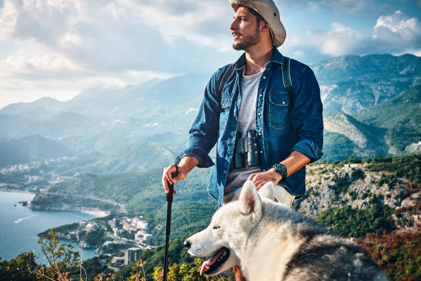istock man and his best friend exploring the mountain 1173566805