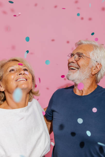 istock Smiling senior couple celebrates their anniversary 1173566834