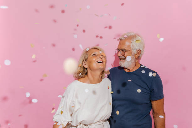 Smiling senior couple celebrates their anniversary