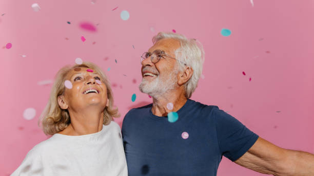 istock Smiling senior couple celebrates their anniversary 1173566966