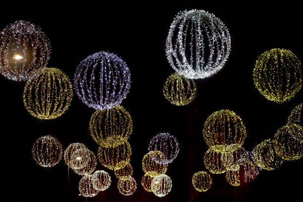 Christmas decorations in Ribeauville Alsace, blue teal and orange lanterns and balls