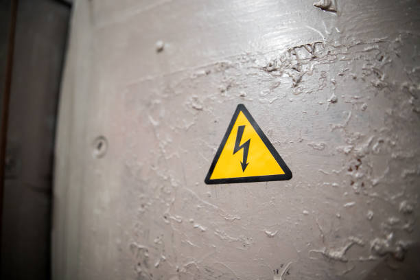istock high voltage warning sign on high-voltage substation 1173569218