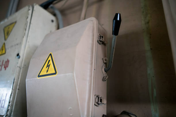 istock high voltage warning sign on high-voltage substation 1173569424