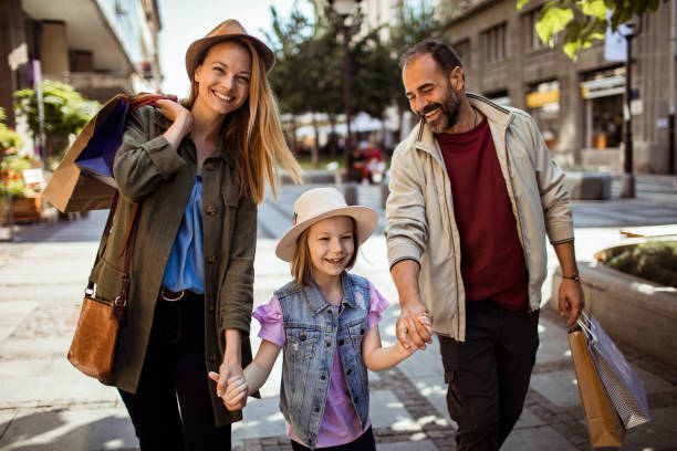 istock Family out shopping 1173570678