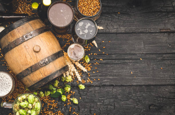 istock Barrel and Glass beer with Brewing ingredients. 1173571742