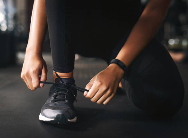 istock Making sure my laces are tied so I don't trip 1173575411