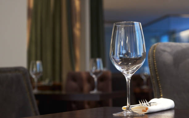 Silver service formal dining setting in luxury penthouse mansion
