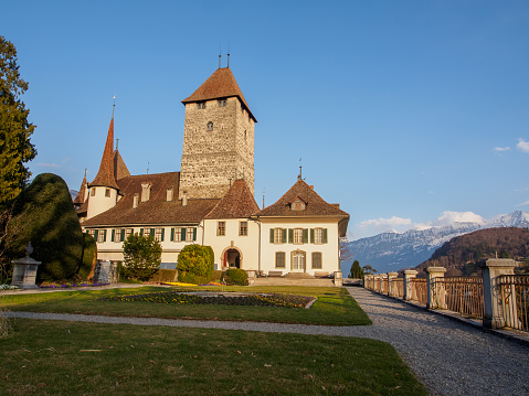 The beautiful Lenzburg Castle above Lenzburg City in the Canton of Aargau. The oldest parts of the castle date to the 11th century, it contains a huge museum with its history. The high angle image was captured during springtime.