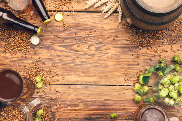 istock Barrel and Glass beer with Brewing ingredients. 1173580416