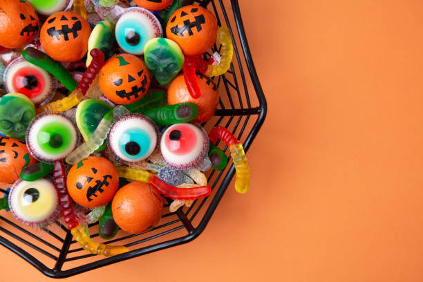 istock Funny Haloween candy in a spiderweb bowl 1173581060