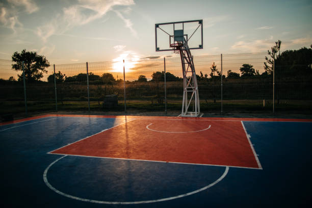 istock Basketball playground at sunset 1173581204