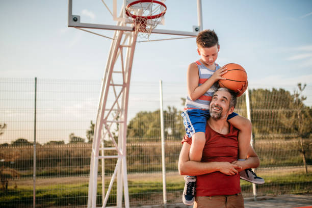 istock Assistance for little basketball player 1173581288