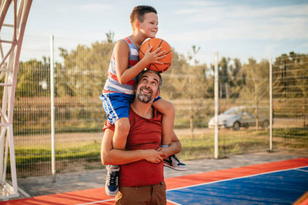 istock Assistance for little basketball player 1173581297