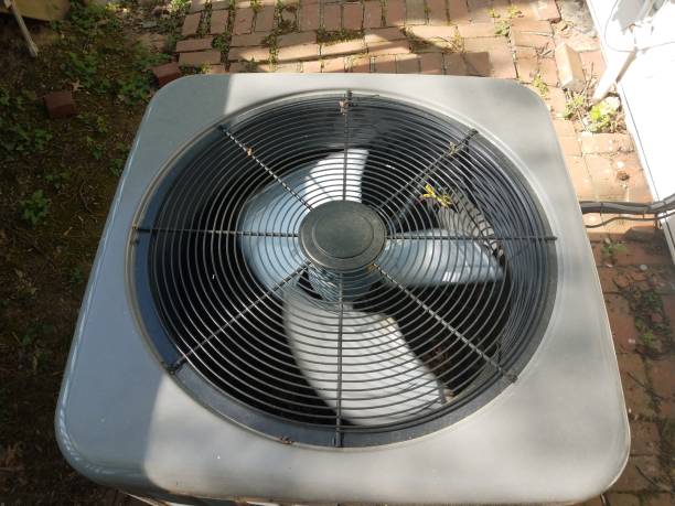 istock air conditioner unit or fan with blades spinning 1173581303