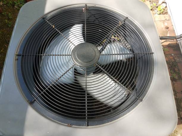 istock air conditioner unit or fan with blades spinning 1173581332