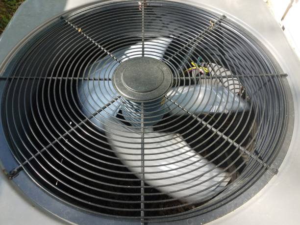 istock air conditioner unit or fan with blades spinning 1173581351