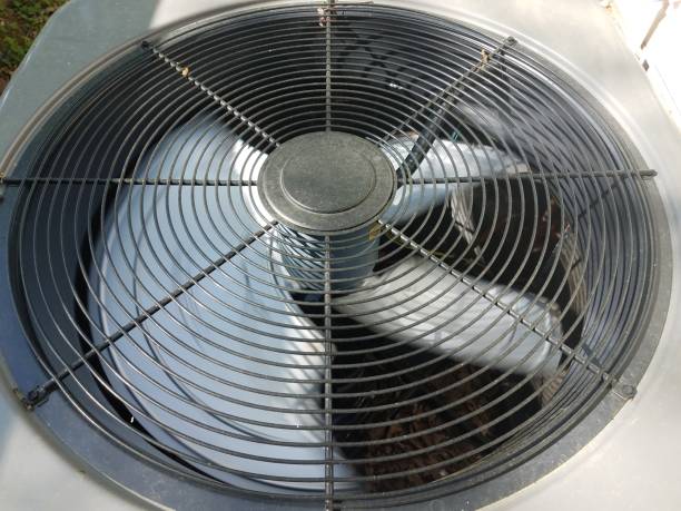 istock air conditioner unit or fan with blades spinning 1173581396