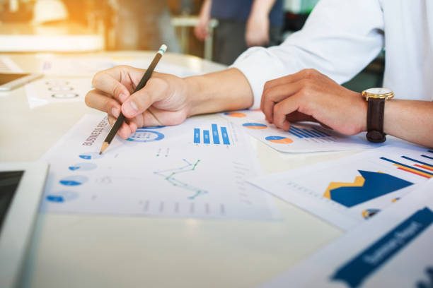 istock Business Corporate team brainstorming with chart and checking and analysis 1173582604